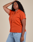 Pantry Button-Up in Chili Red angled front view on Meghna