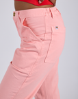 Work Pants in Baby Pink side view close up on Kira