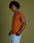 Side view of Vintage Ringer Tee in Burnt Terracotta on Jerrod