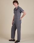 Angled front view of Short Sleeve Jumpsuit in Washed Grey on Quinn