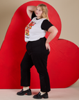 Side view of Vintage Tee in Don't Call Me and black Western Pants on Juliet