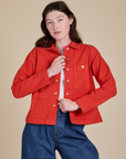Denim Work Jacket in Mustang Red worn by Alex