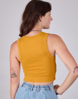 Cropped Tank Top in Mustard Yellow back view on Alex