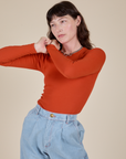 Long Sleeve Baby Tee in Chili Red worn by Alex