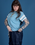 Painted Burly Tee in Baby Blue angled front view on Sydney