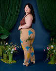 Angled back view of Paintstamped Work Pants in Froggy on Ashley