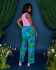 Angled back view of Paintstamped Work Pants in Lilypad and bubblegum pink Cropped Tank