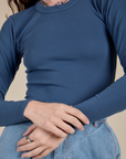 Long Sleeve Baby Tee in French Blue front close up on Alex