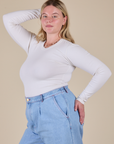 Long Sleeve Baby Tee in Vintage Tee Off-White angled front view on Lish