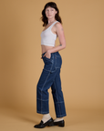 Mid-Rise Carpenter Jeans in Dark Wash and Cropped Tank in Vintage Tee White on Alex