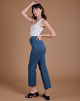Angled back view of Organic Work Pants in French Blue on Alex