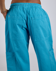 Close up back view of Drop Pocket Cargo Pants in Hawaiian Blue on Kira