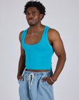 Isaac is 5’10” and wearing M Cropped Tank Top in Hawaiian Blue