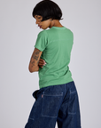 Jr. Varsity Tee in Seafoam Green angled back view on Kira