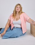 Pantry Button-Up in Baby Pink and light wash Denim Drop Pocket Pants on Juliet