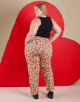 Back view of Work Pants in Hot Stuff Print and black Cropped Tank on Juliet