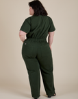 Back view of Short Sleeve Jumpsuit in Swamp Green on Ashley