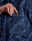 Tiara's hand in front top pocket of the Chain Link Work Jacket