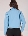 Mechanic Jacket in Baby Blue back view on Alex