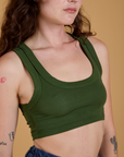 Front close up of Mini Tank in Evergreen worn by Alex