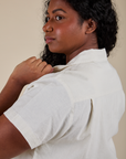 Angled back view close up of Pantry Button-Up in Vintage Tee White on Meghna