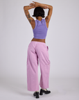 Back view of Drop Pocket Cargo Pants in Lilac Purple and faded grape Cropped Tank on Kira