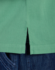 Pantry Button-Up in Seafoam Green side vent close up