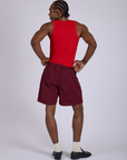 Back view of Pleated Trouser Shorts in Red Wine and mustang red Cropped Tank