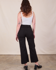 Back view of Western Pants in Basic Black and Cropped Cami in vintage tee off-white on Alex