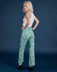 Angled back view of Winter Floral Print Work Pants on Madeline
