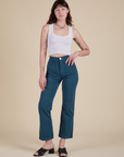 Alex is 5’8” and wearing XS Work Pants in Lagoon