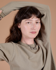 Close up of Long Sleeve Burly Tee in Khaki Grey on Alex