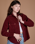 Angled front view of Cropped Corduroy Overshirt in Red Wine on Alex