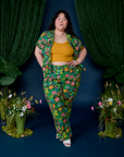 Ashley is 5'7" and wearing 1XL Work Pants in Pond Party paired with matching Pantry Button-Up