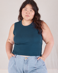 Ashley is 5’7” and wearing XL Muscle Tee in Lagoon