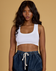 Kandia is 5’3” and wearing P Contrast Stitch Mini Tank in Vintage Tee White