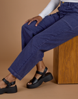 Railroad Denim Work Pants in Faded Grape Overdye pant leg close up