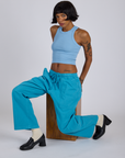 Drop Pocket Cargo Pants in Hawaiian Blue and baby blue Racerback Tank worn by Kira