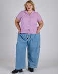Juliet is 5’7” and wearing L Pantry Button-Up in Lilac Purple paired with light wash Denim Drop Pocket Pants