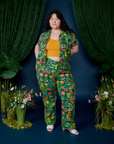 Ashley is wearing Pond Party Pantry Button-Up and matching Work Pants