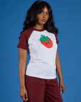 Angled front view of Produce Raglan Tee in Strawberry on Kandia