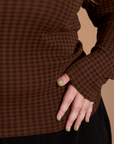 Close up Long Sleeve Baby Tee in Fudgesicle Brown bottom on Juliet