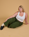 Baggy Mid-Rise Trousers in Evergreen and vintage tee white Cropped Tank worn by Juliet