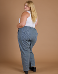 Railroad Denim Work Pants in Natural angled back view on Juliet