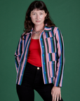 Alex is 5’8” and wearing P Stripe Work Jacket in Pacific Stripe