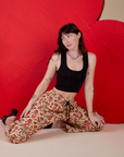 Hot Stuff Drop Pocket Cargo Pants and black Cropped Tank worn by Alex