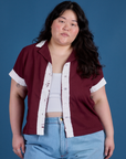 Ashley is wearing Painted Pantry Button-Up in Red Wine
