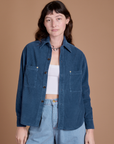 Alex is 5'8" and wearing P Cropped Corduroy Overshirt in French Blue