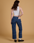 Mid-Rise Carpenter Jeans in Dark Wash back view on Alex