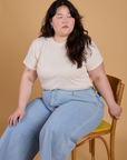 Organic Vintage Tee in Vintage Off White and light wash Indigo Wide Leg Trousers worn by Ashley